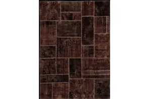 Tappeto assembtato con parti di vecchi tappeti
