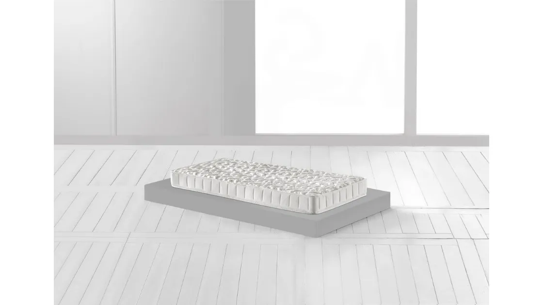 Materasso Fiaba 5 Plus creato per l'infanzia con rivestimento in tessuto antisoffoco in viscosa e imbottitura in fibra anallergica di Magniflex