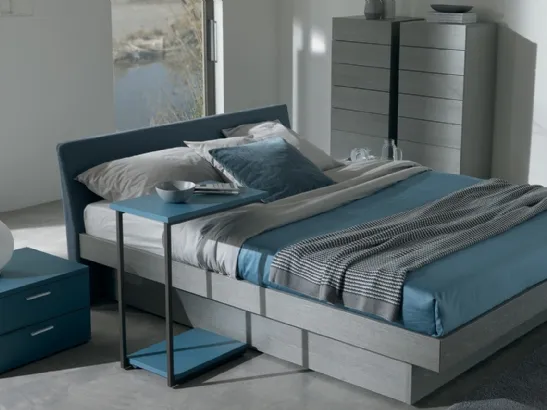 Letto in legno con testiera rivestita in tessuto e box contenitore Daimo di Essedue