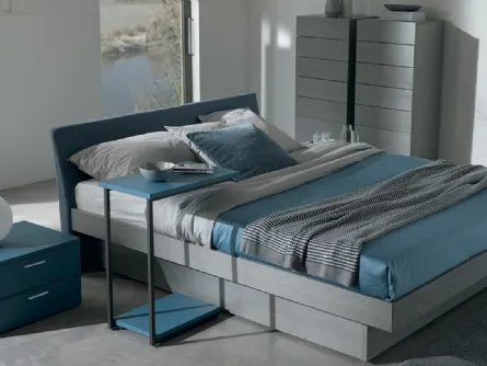 Letto in legno con testiera rivestita in tessuto e box contenitore Daimo di Essedue